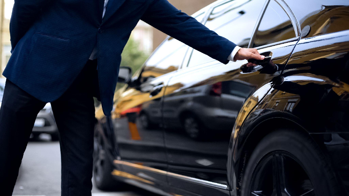 Private driver San Francisco in a luxury black car on a scenic California road